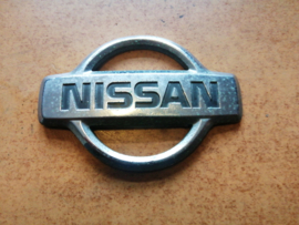 Emblem-trunk lid Nissan Almera N15 84890-0N000 Used part.