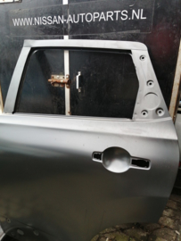 Portier linksachter Nissan Qashqai J10 H2101-JD0M0 Lichte schade/ Origineel.