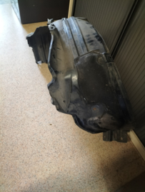 Binnenscherm Rechtsvoor Nissan Primera P12 63840-AV600 Gebruikt.