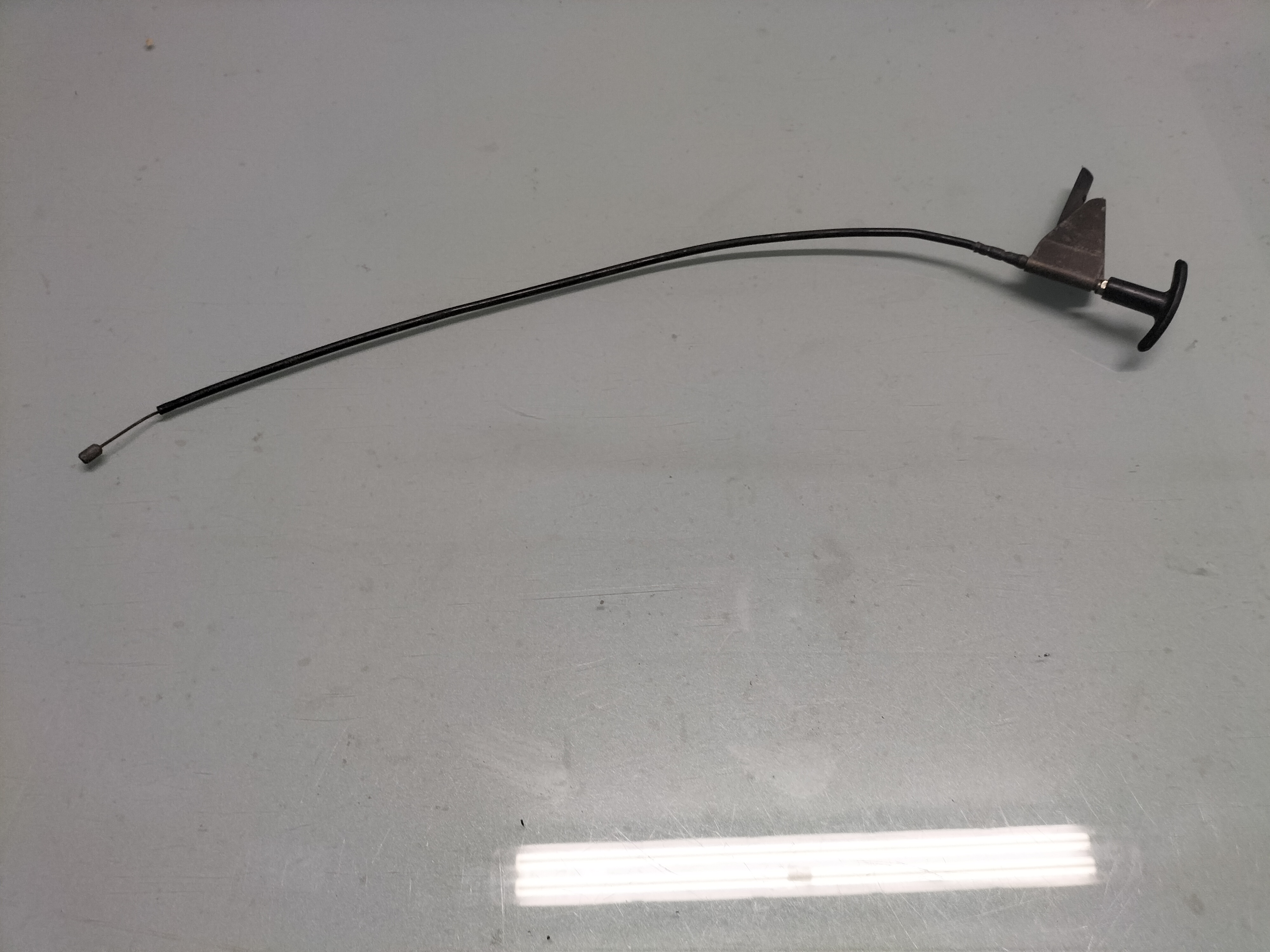 Assy-control, hood lock Datsun Cherry E10 65660-M1003 Used part.