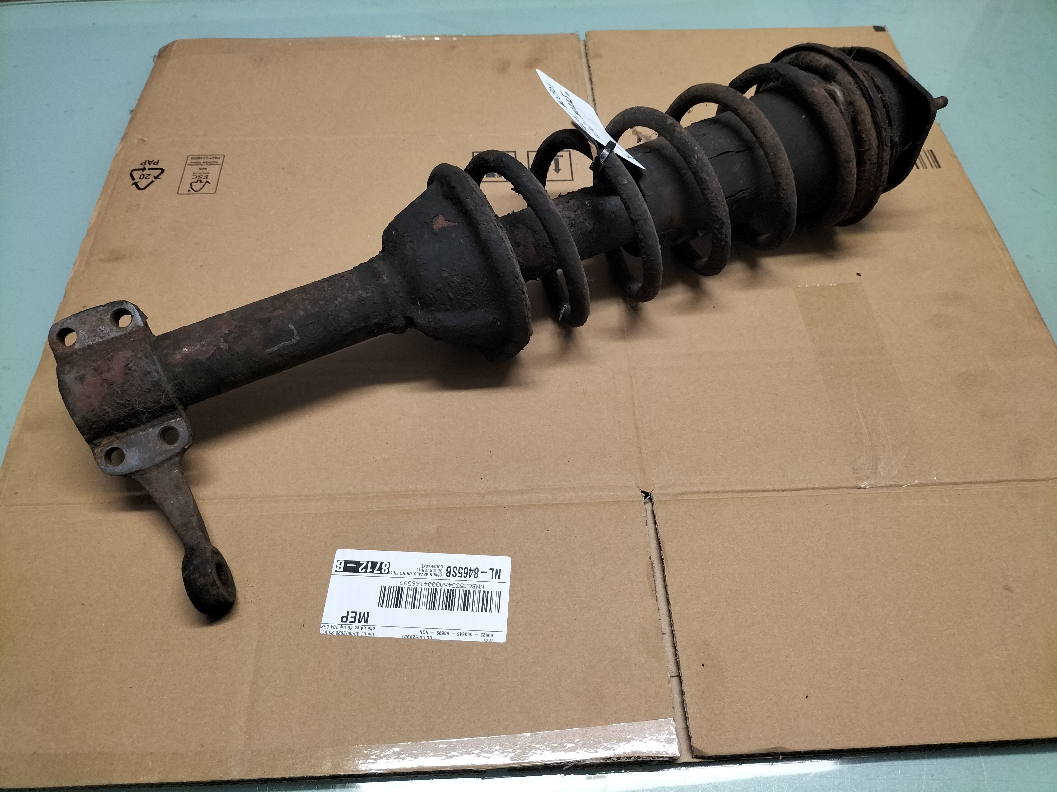 Veerpoot Linksvoor Datsun cherry E10 54010-M0801 + 54303-M0225 Gebruikt