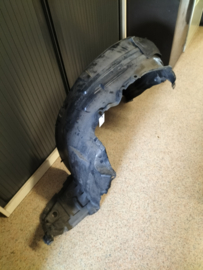 Binnenscherm Rechtsvoor Nissan Primera P12 63840-AV600 Gebruikt.