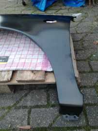 Zijscherm links Nissan Micra K11 63101-73B30 Primer, Nieuw.