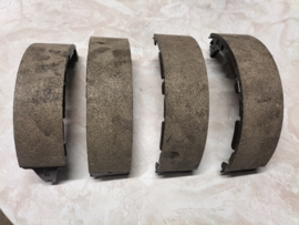 Shoe-set rear brake 254 X 60 Nissan King Cab D21 DD060-31G25 Original.