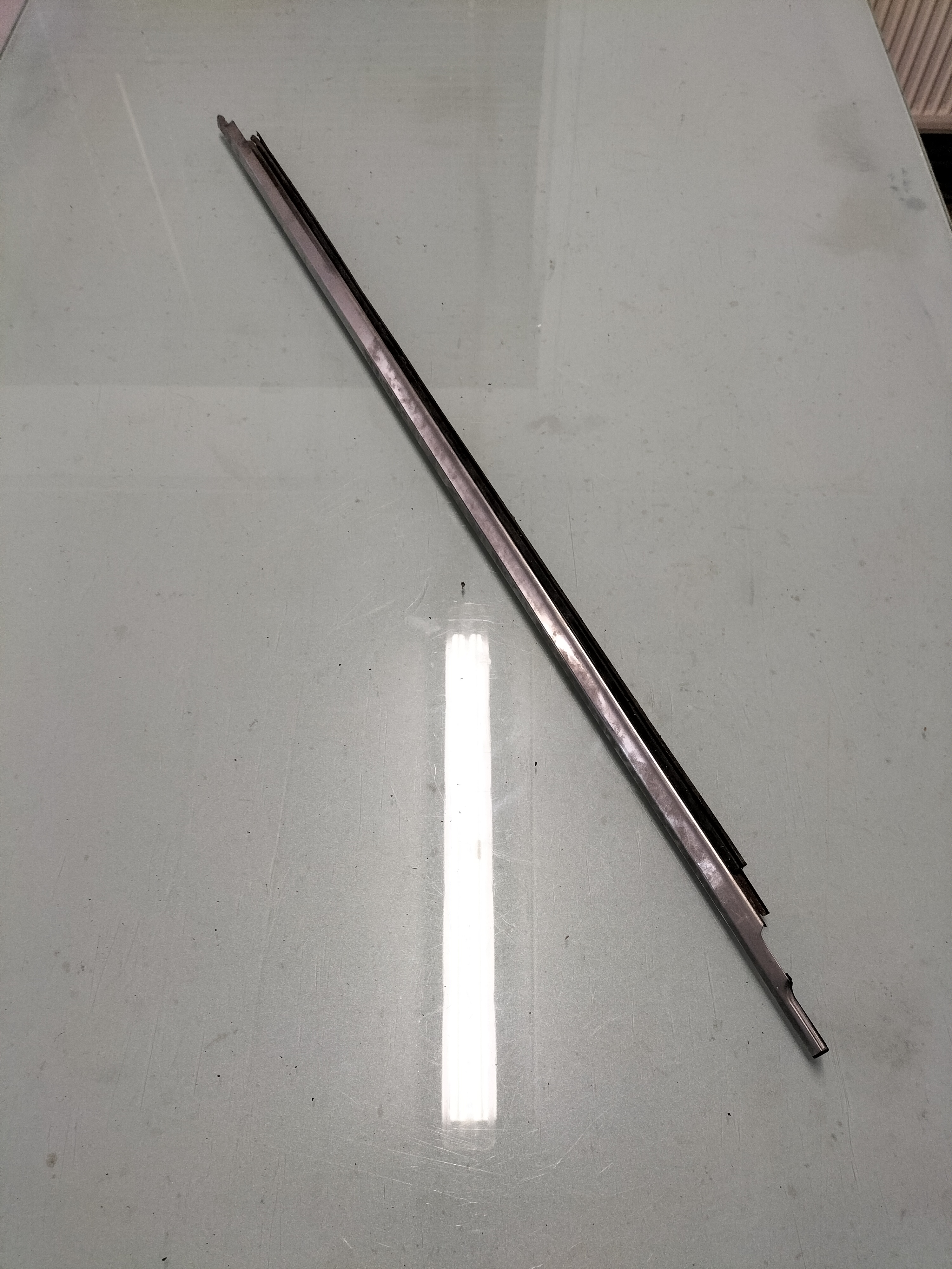 Assy-weatherstrip waist, front left-hand Datsun Cherry E10 80319-M0204 Used part.