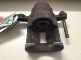 Remklauw rechtsachter Nissan 44001-EM11A J10/ JJ10/ Z12 Gebruikt.