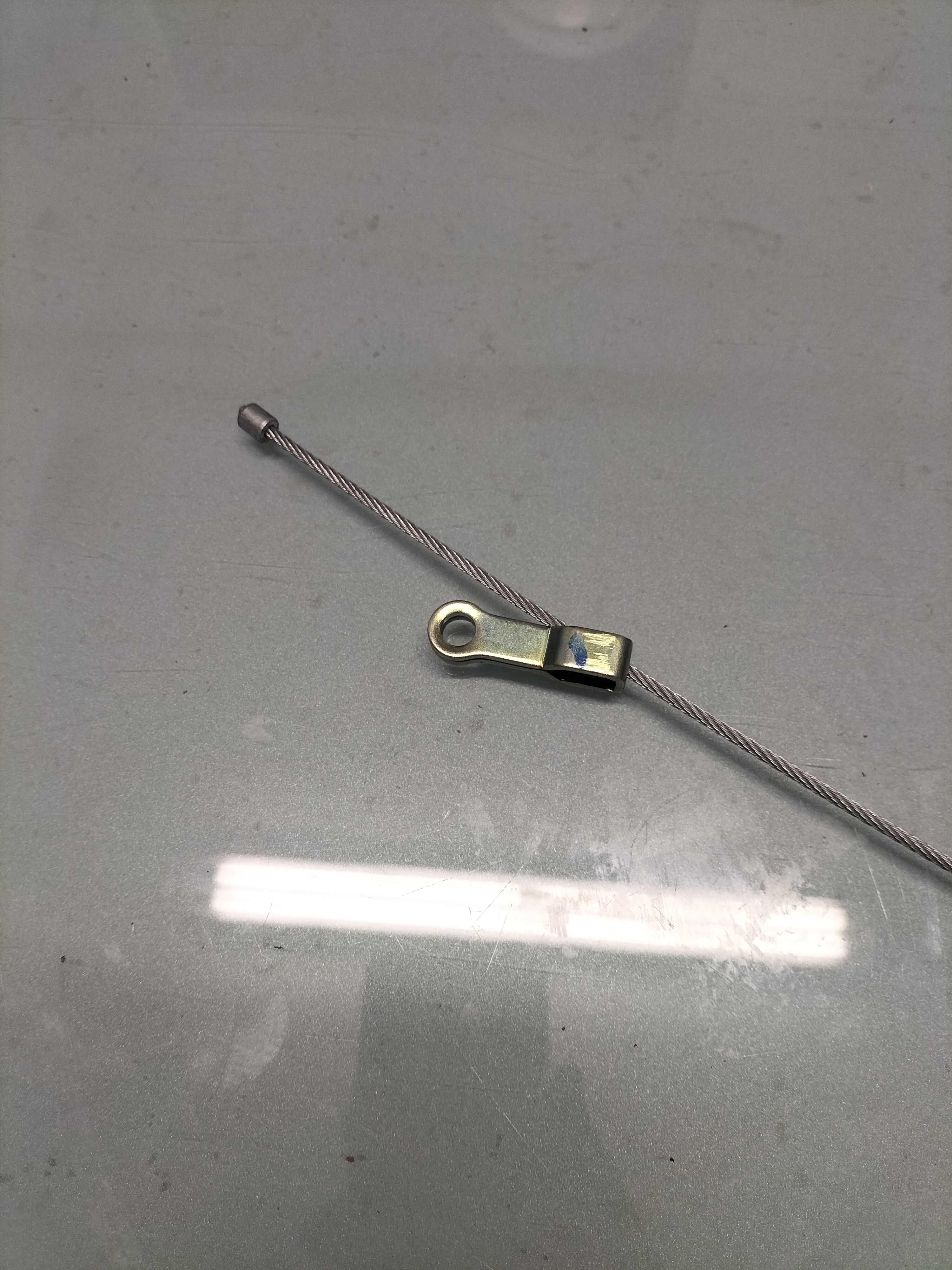 Handrem Kabel Nissan 36450-M0201 Origineel.