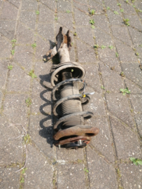 Strut front right-hand Nissan 54302-52C27 + 54010-0M001 (54302-52C02) Used part.