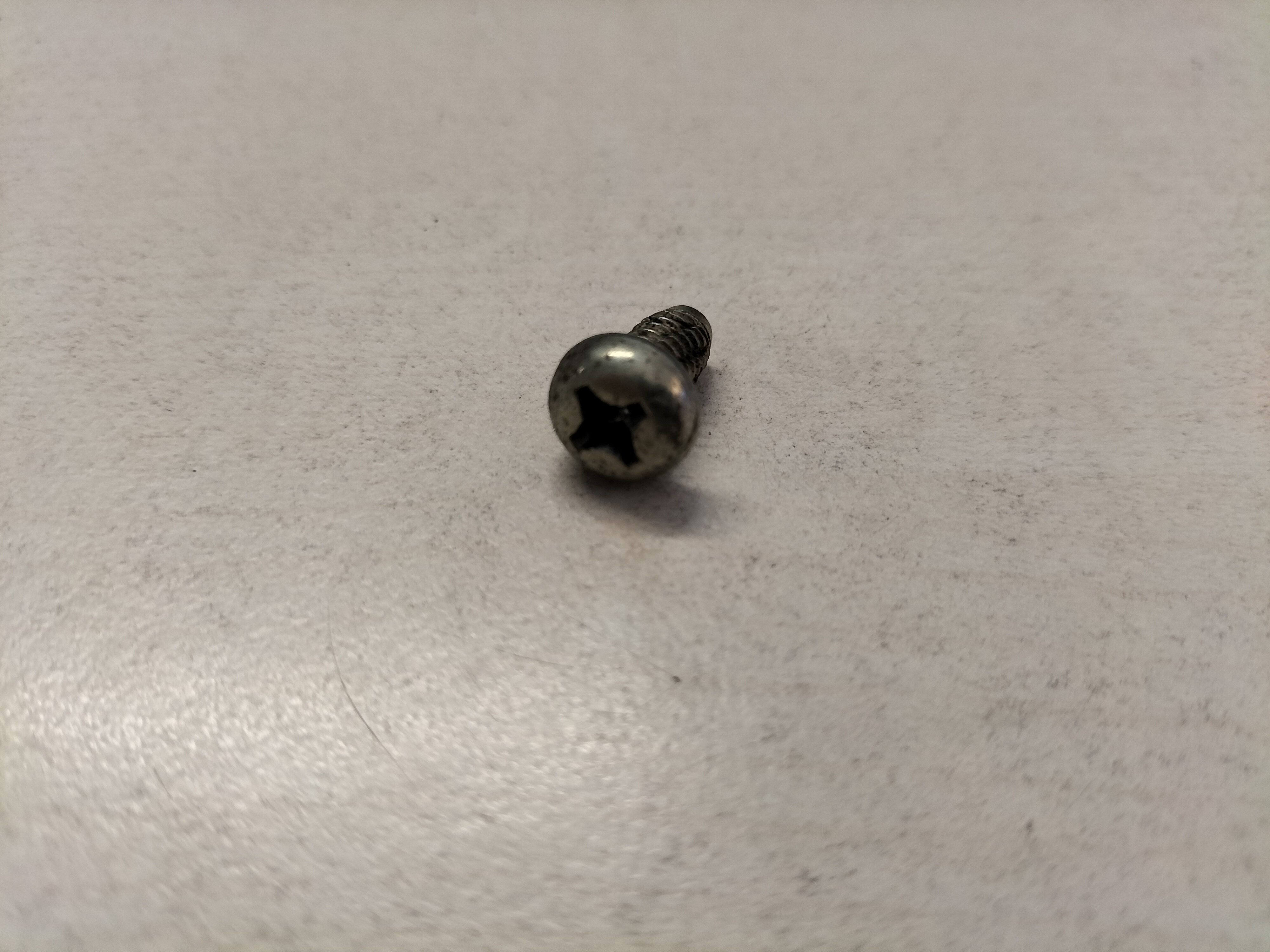 Screw clock Datsun Cherry E10 68207-M0200 Used part.