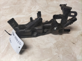 Koelwateruitlaatflens HR09DET/ HRA2DDT Nissan 11060-00Q1D (11060-8635R) C13/ F15/ J11/ K14 Gebruikt.