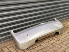 Achterbumper Nissan Micra K12 85022-AX640 Gebruikt. Lichte schade.