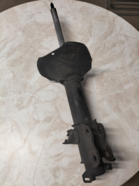 Schokdemper achteras links Nissan Primera P10 55303-71J25 Gebruikt.