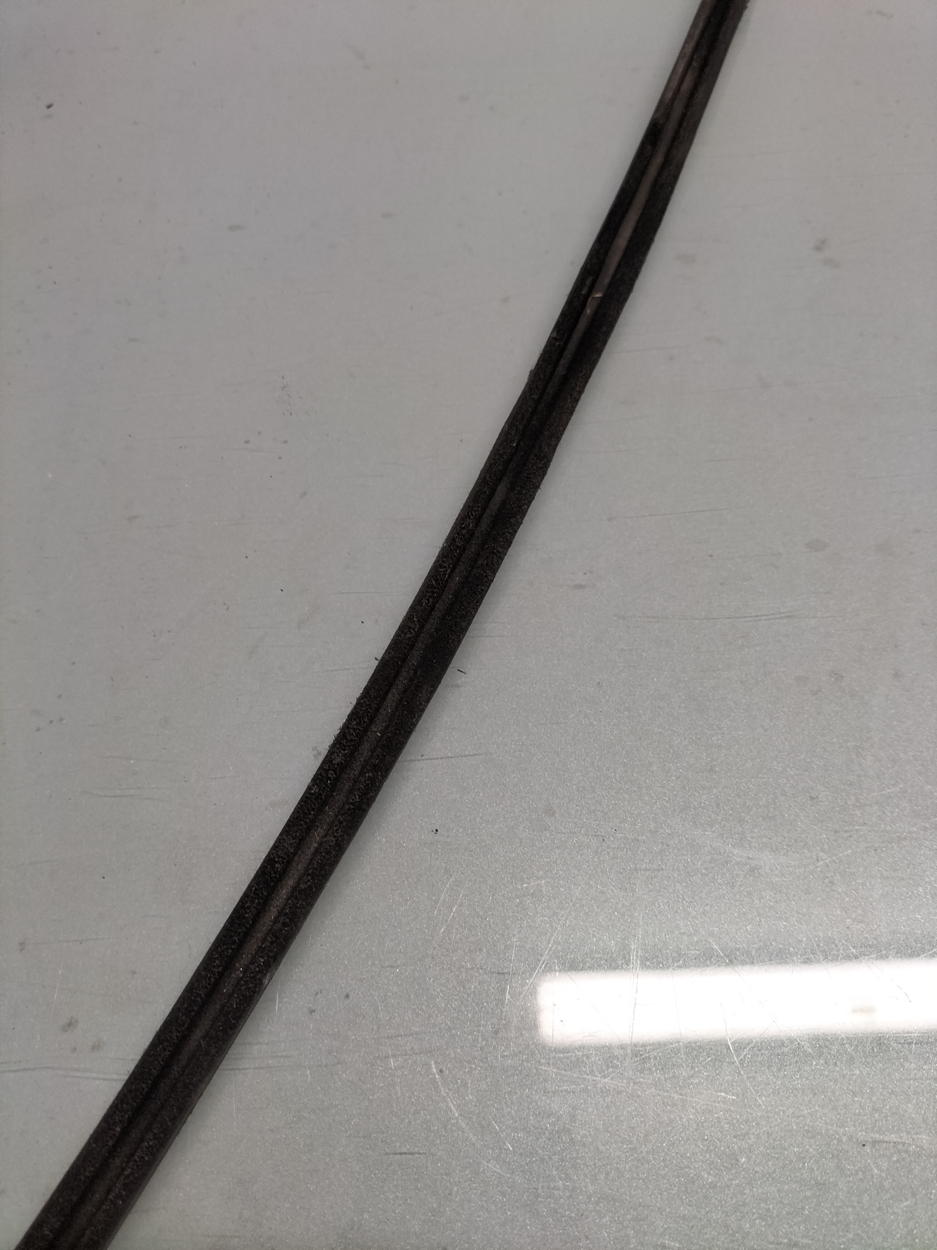 Assy-glass run ''B'' Datsun Cherry E10 80338-M0202 Used part.