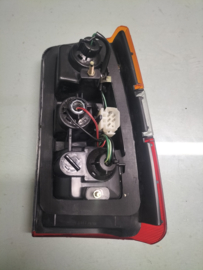 Achterlicht links Nissan Sunny B11 Van - uitvoering 26555-26A00 (IKI 4303) Origineel.
