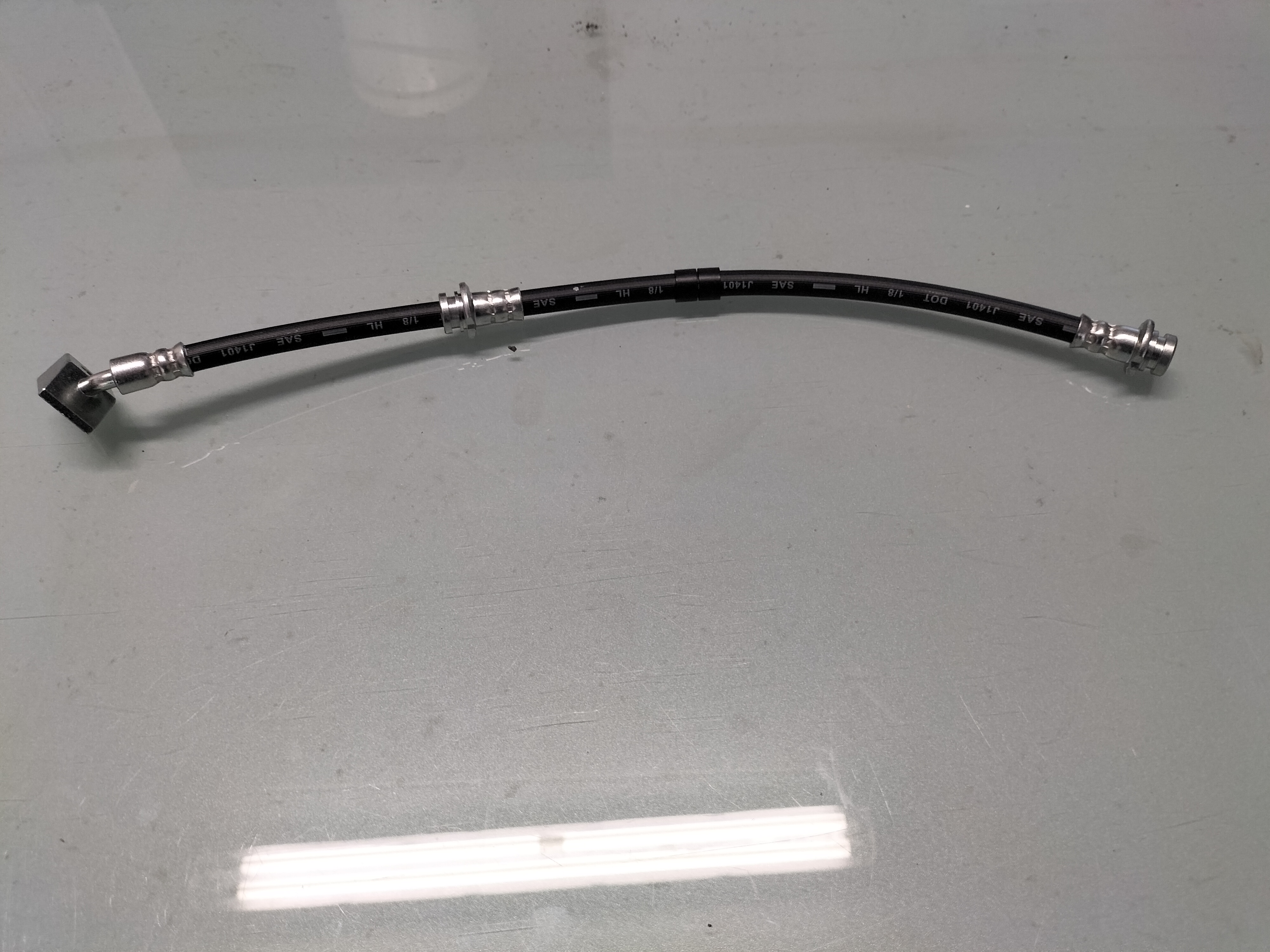 Remslang linksvoor Nissan Bluebird T72 46210-Q9005 Nieuw.