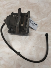 Remklauw linksvoor Nissan 41011-1HA0A E12/ K14 Gebruikt.