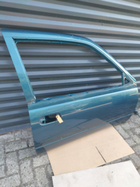Portier rechtsvoor Nissan Sunny N14 80100-73C30 (FK1) 3-deurs Gebruikt.
