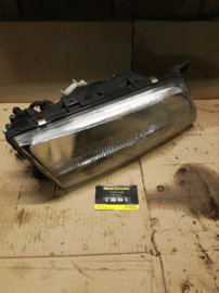 Koplamp rechts Nissan Almera N15 26010-1N826 (26010-1N726) Gebruikt.