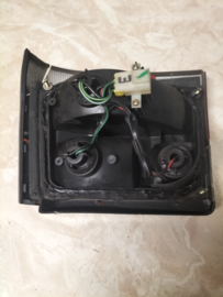 Achterlicht links Nissan Micra K10 26555-04B65 (20250326) Lichte schade.