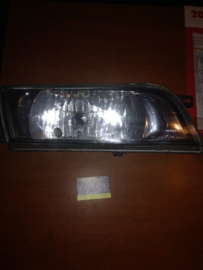 Koplamp rechts Nissan Almera N15 26010-2N328 Gebruikt.