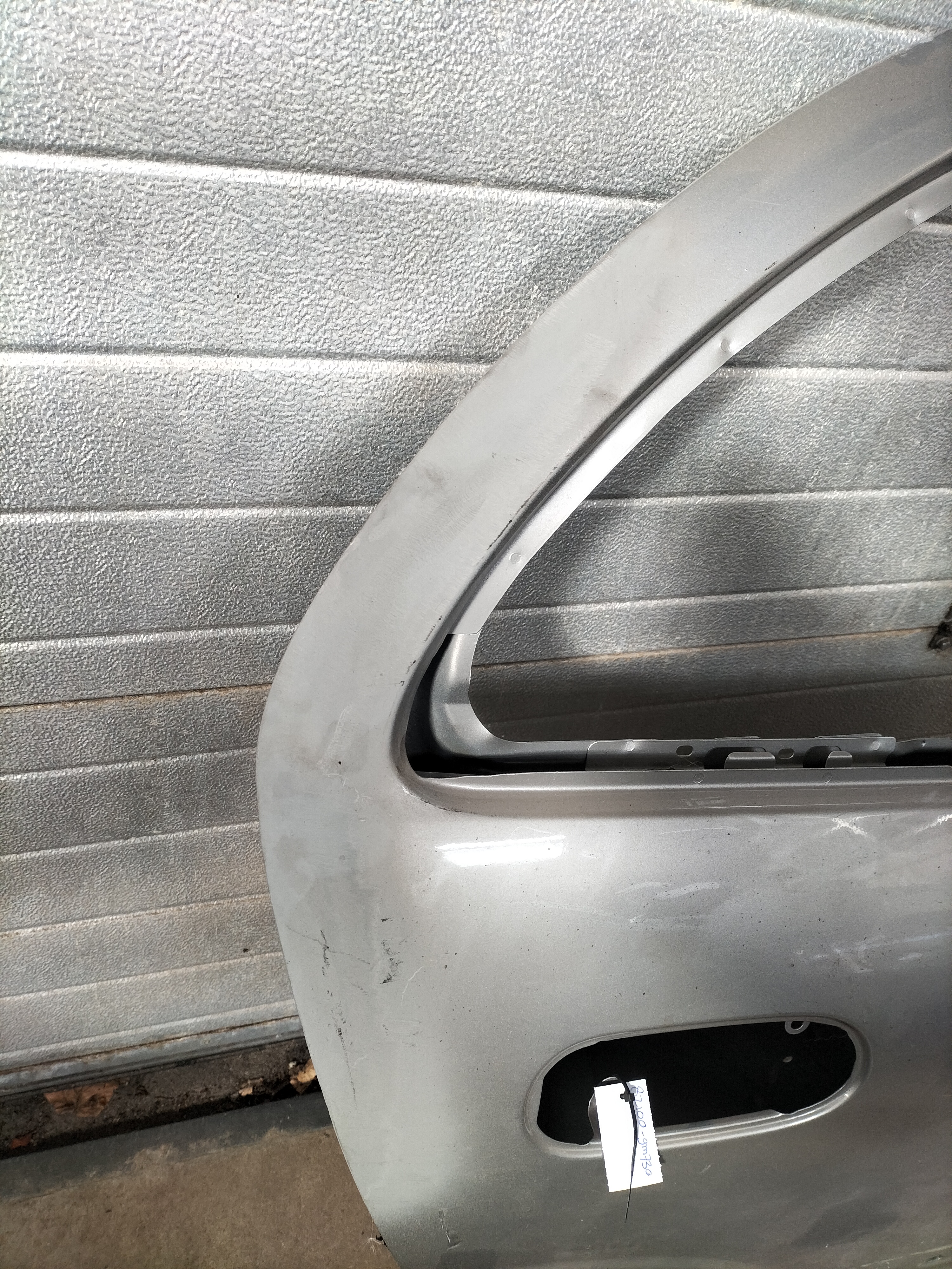 Door-rear, right-hand Nissan Almera N16 sedan 82100-9M730 gray.