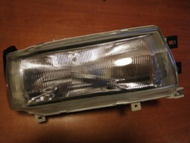 Koplamp rechts Nissan Bluebird T72 B6010-Q9203 Nieuw.