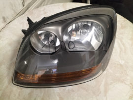 Lamp left-hand Nissan Almera Tino V10 26060-BU200 Used part. Little Damage.