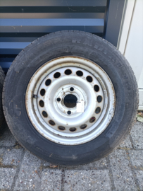 13 inch stalen velgen met band 175/70R13 40300-4F400 (20260712) Nissan Micra K11. Gebruikt.