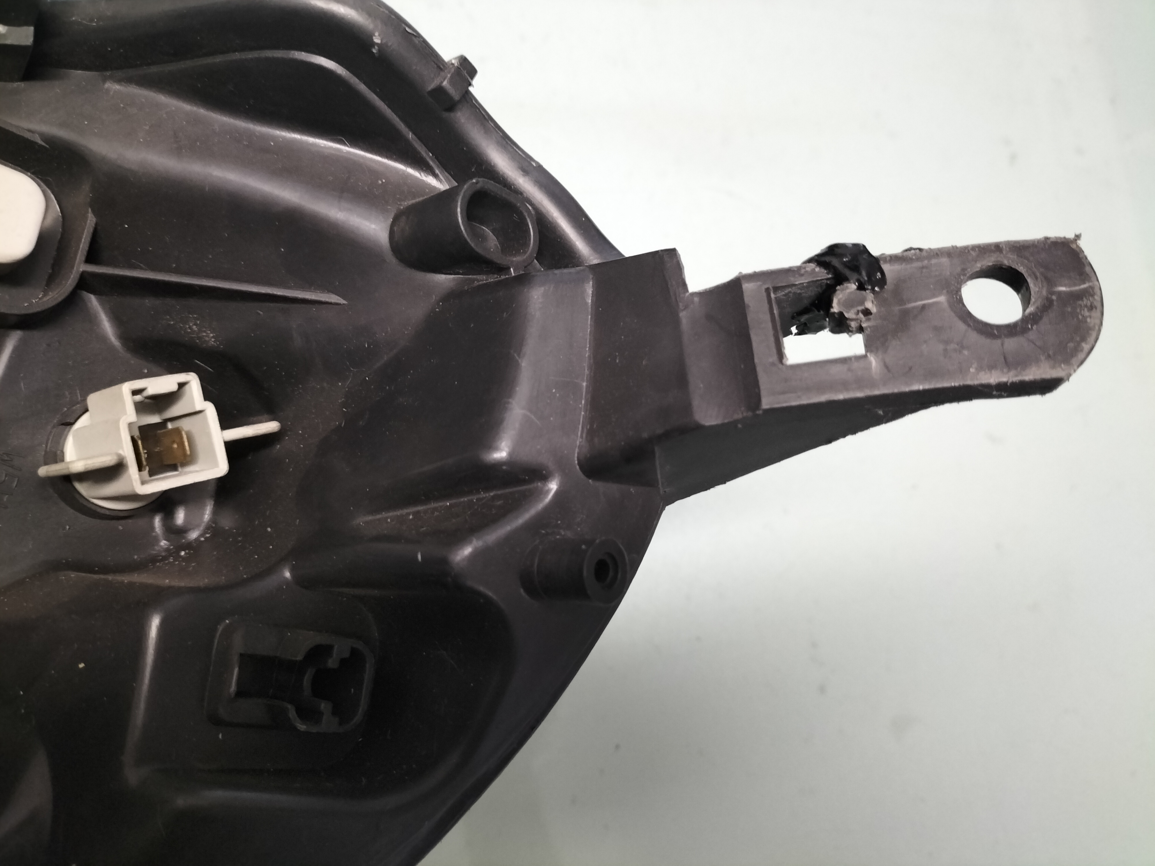 Koplamp Links Nissan Micra K12 26060-BG10B Gebruikt. Gerepareerd.