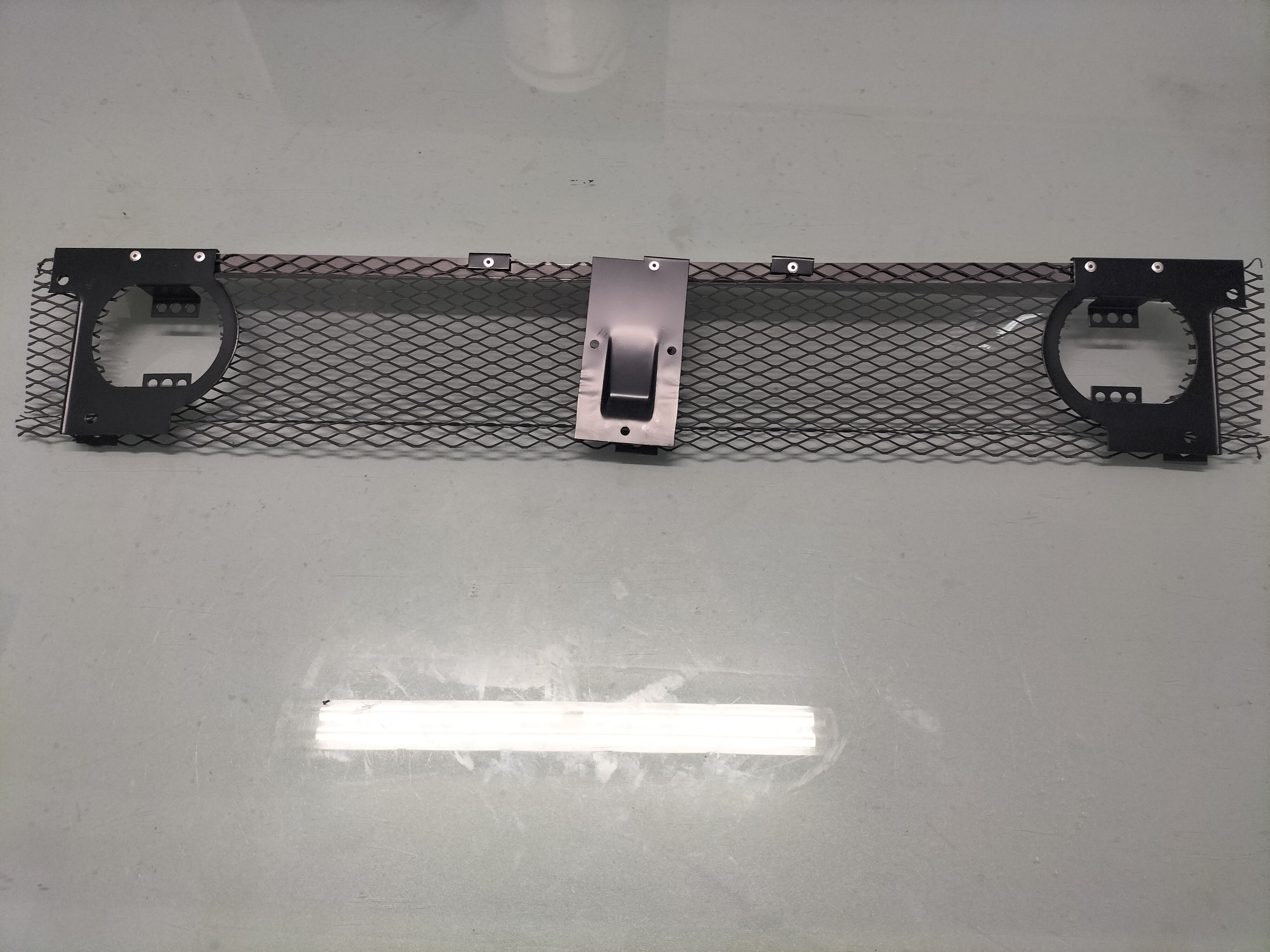Grille Nissan 62310-M0910 Origineel.