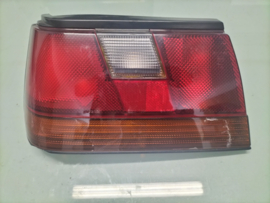 Achterlicht links Nissan 26559-89M20 Gebruikt. Lichte schade.