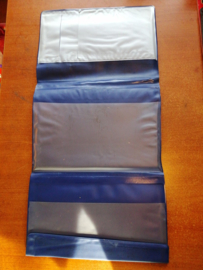 Folder user manual Nissan blue logo vertical.