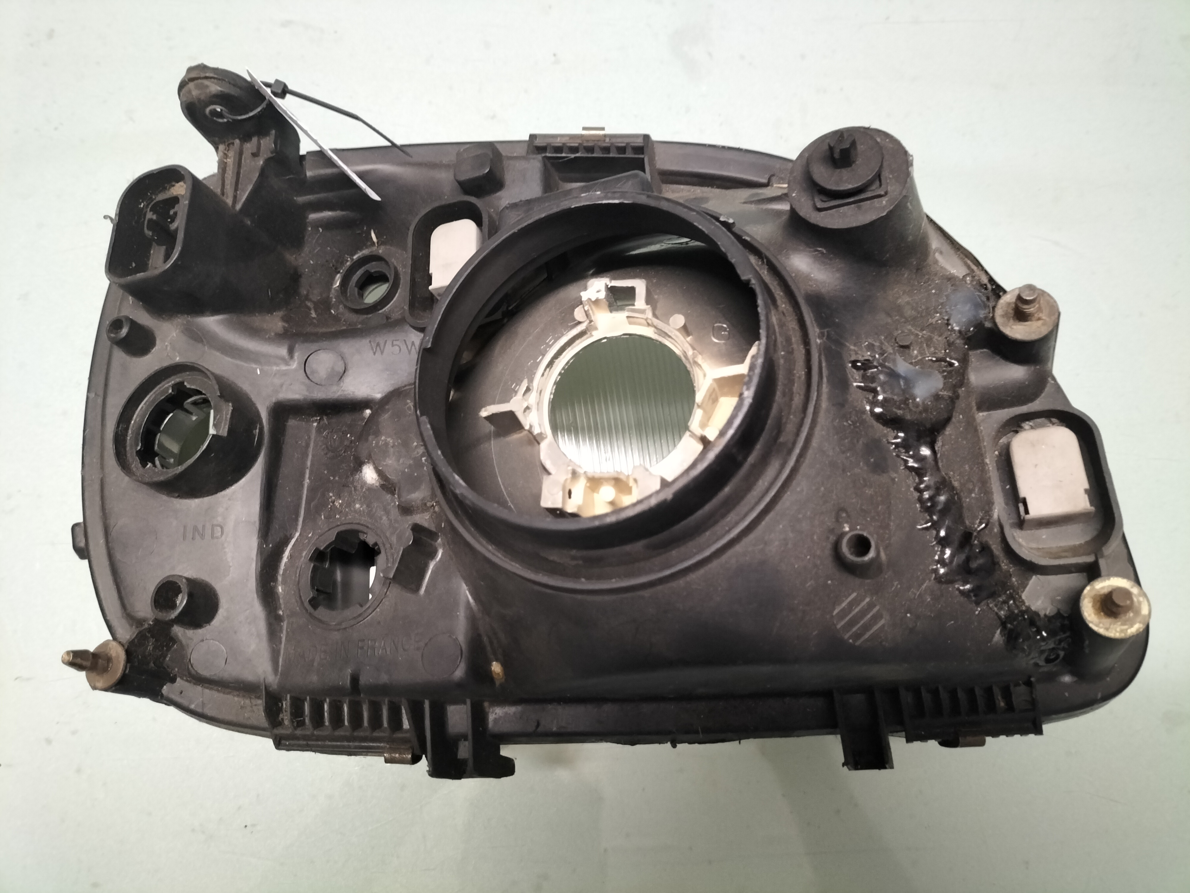 Koplamp Links Nissan Micra K11 26060-6F620 Gebruikt gerepareerd.