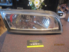 Koplamp rechts Nissan Almera N15 26010-2N328 Origineel.