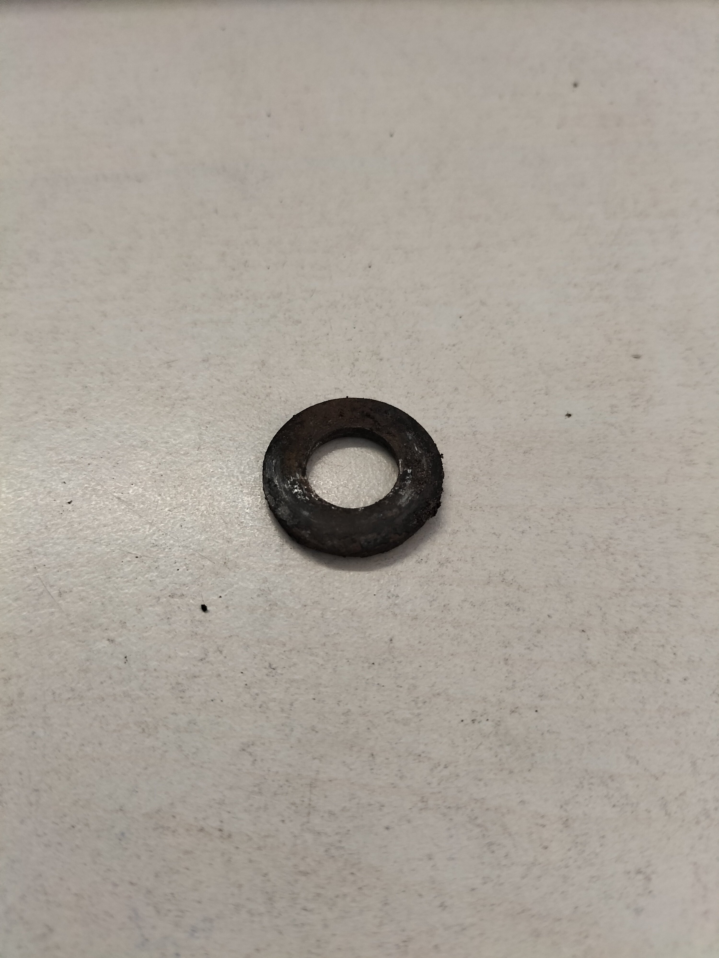 Washer-plain 10 x 19.5 x 2 Datsun 01311-00082 Used part.