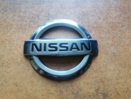 Emblem-trunk lid Nissan X-Trail T31 84890-JG00A Used part.
