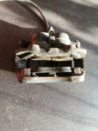 Caliper front left-hand, without pads or shims Nissan Terrano2 R20 41011-7F00A Used part.