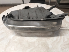 Koplamp links Nissan Bluebird T12 B6060-D4600 (54319328) Gebruikt. Lichte schade.