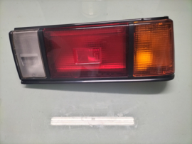 Lamp rear combination, outher right-hand Nissan Sunny B11 sedan 26550-03A10 Original.