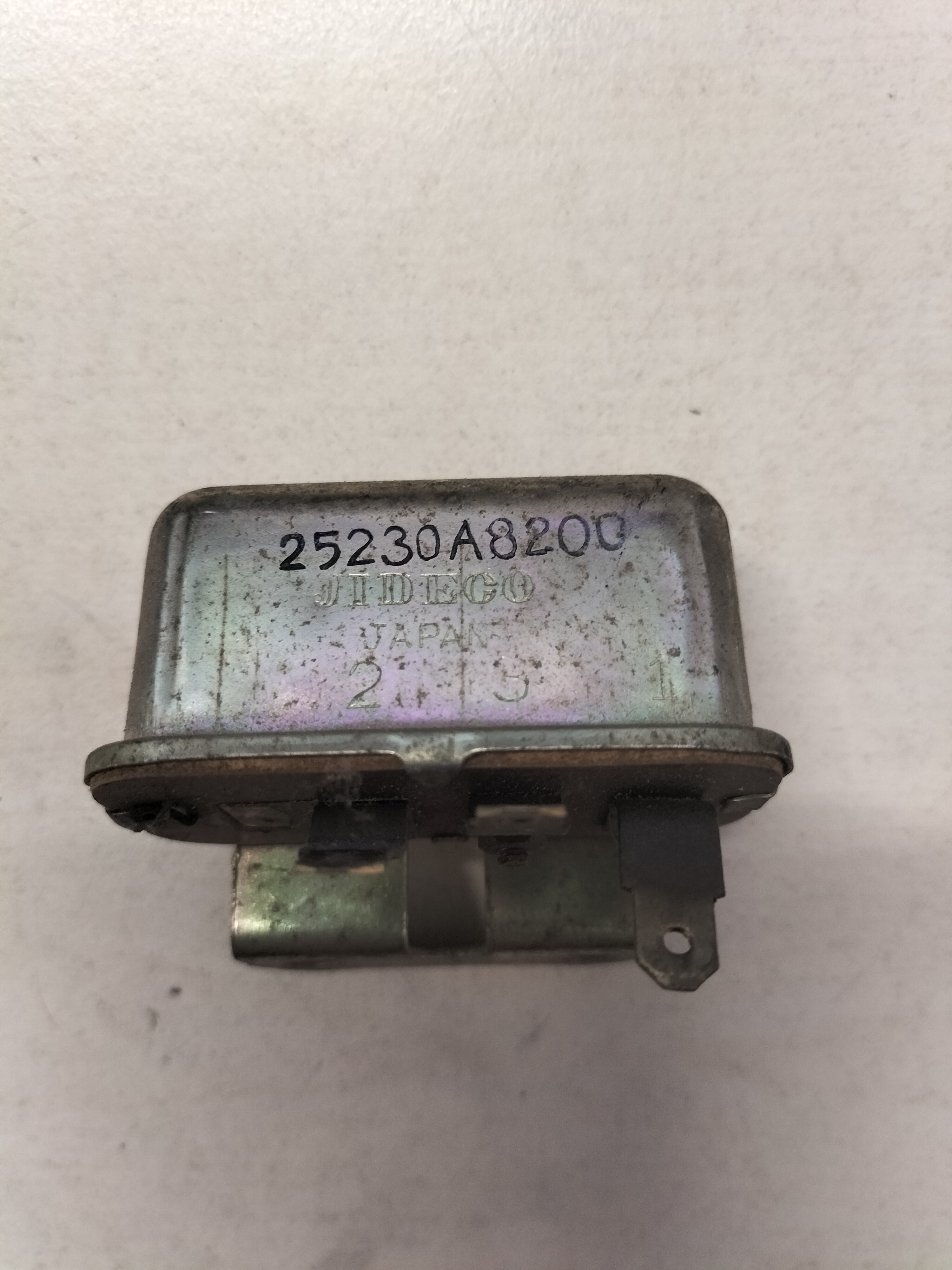 Relais koelventilator/ achterruitverwarming Datsun Cherry E10 25230-A8200 Gebruikt.