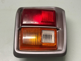 Achterlicht links Datsun Cherry E10 sedan 26559-M0912 Origineel.