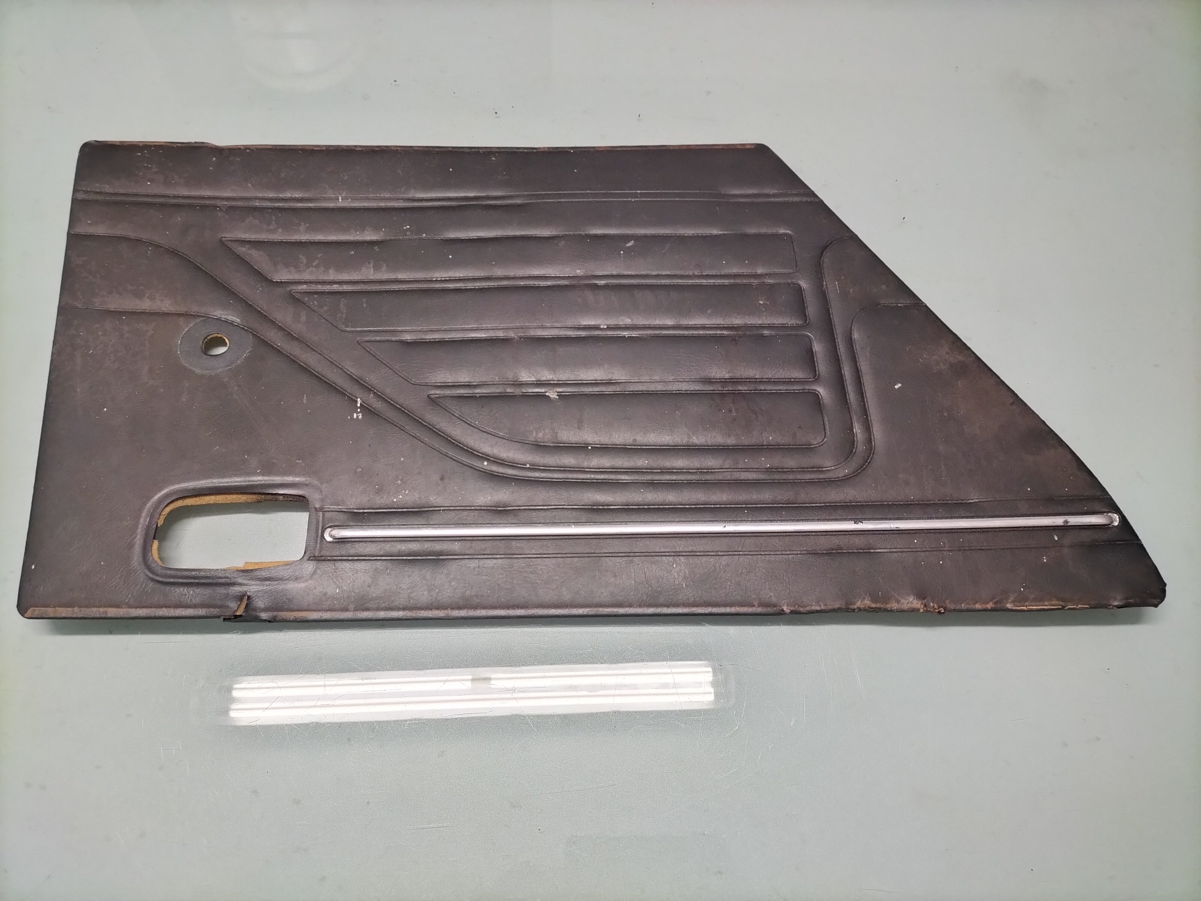 Assy-trimming rear door, left-hand Datsun Cherry E10 82901-M0400 Used part. Little damage.