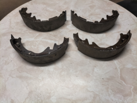 Shoe-set rear brake 254 X 60 Nissan King Cab D21 DD060-31G25 Original.