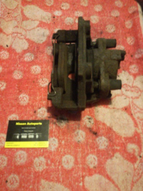 Remklauw rechtsvoor SR20DE Nissan Primera P11/WP11 41001-9F500 Gebruikt.