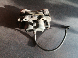 Remklauw linksvoor Nissan Terrano2 R20 41011-7F00A Gebruikt.