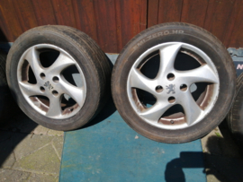 15 inch aluminium velgen met band 185/60R15 & 195/55R15 Peugeot.