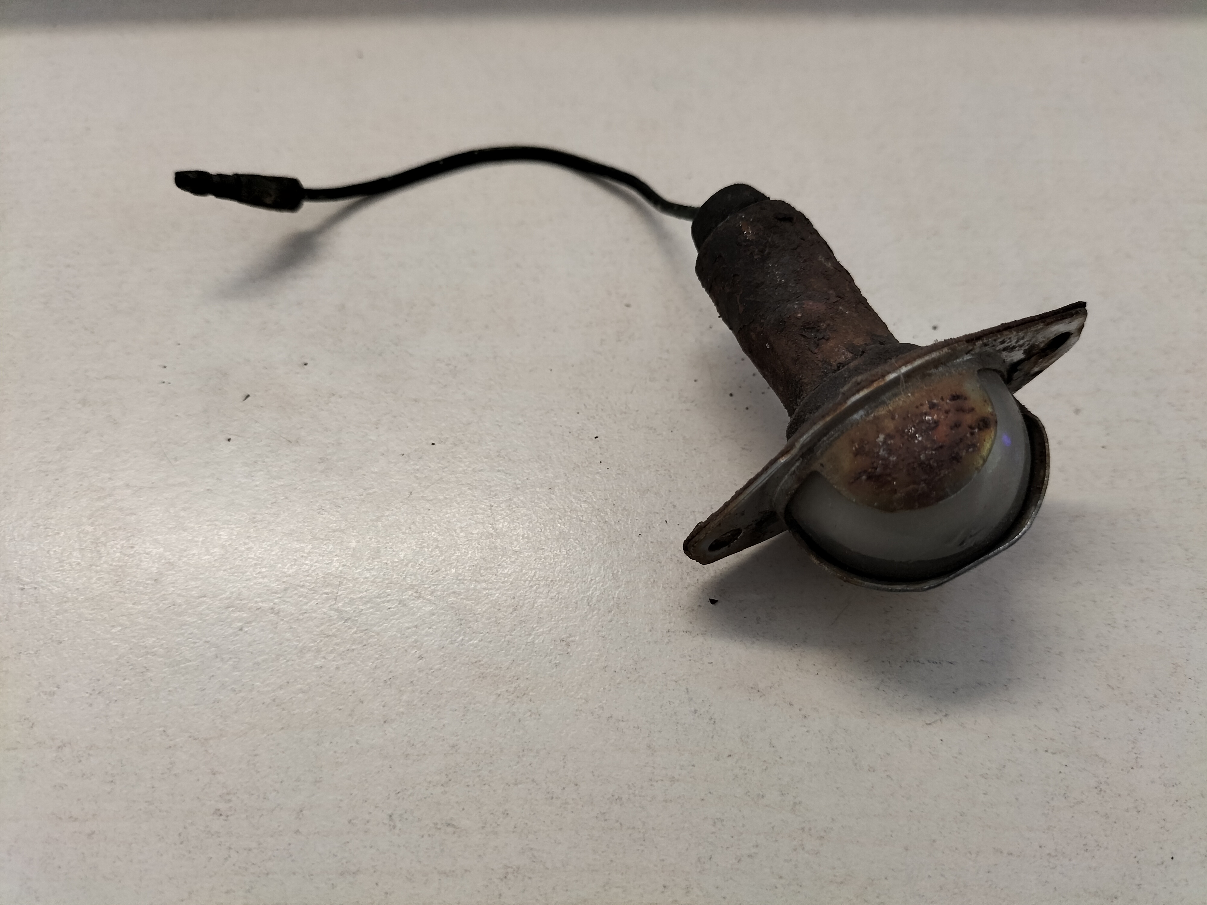 Assy-lamp, licence plate right-hand Datsun Cherry E10 26510-M0900 Used part.