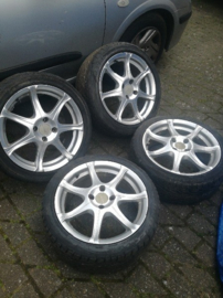 16 inch aluminium velgen met band 215/40R16 4x100 ET38 16X7JJ naafgat 59,1 B13/N14/N15