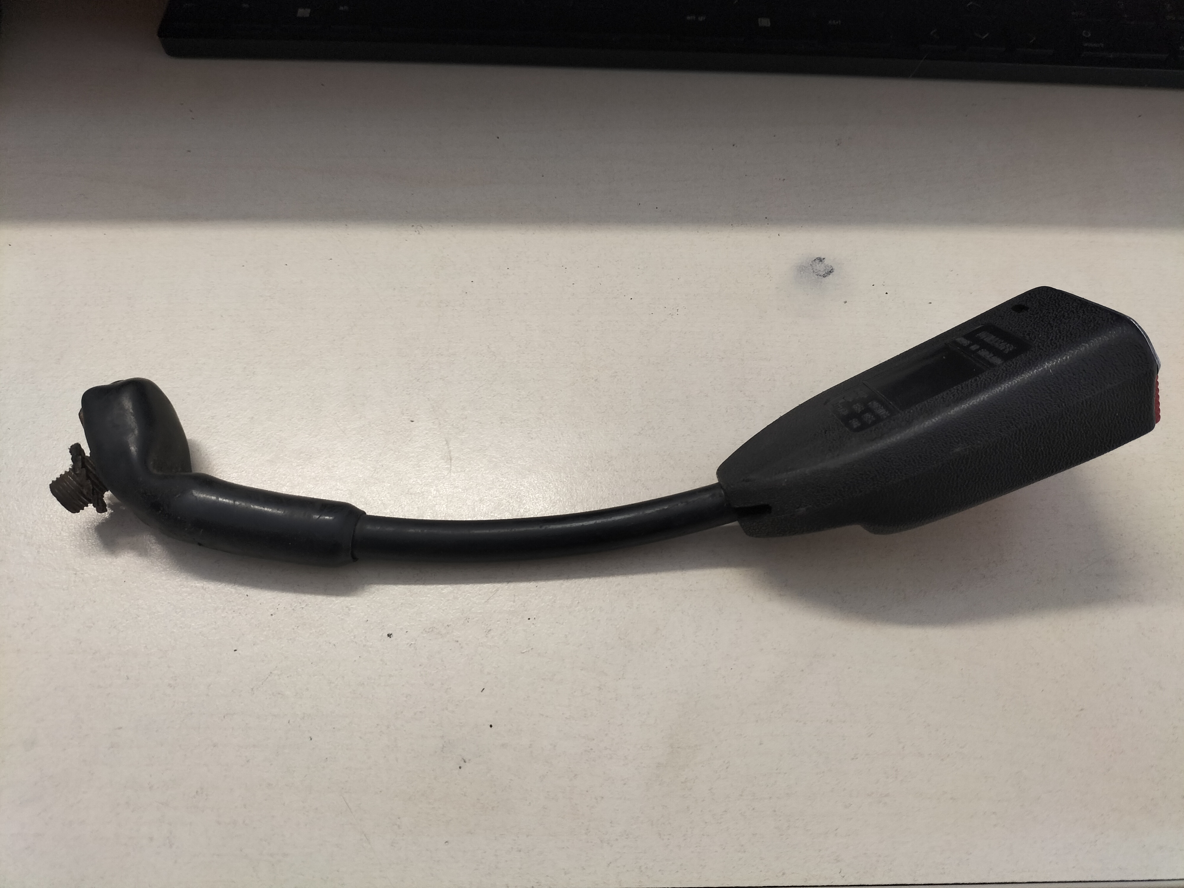 Belt front seat buckle, left-hand Datsun Cherry E10 86843-M0200 Used part.