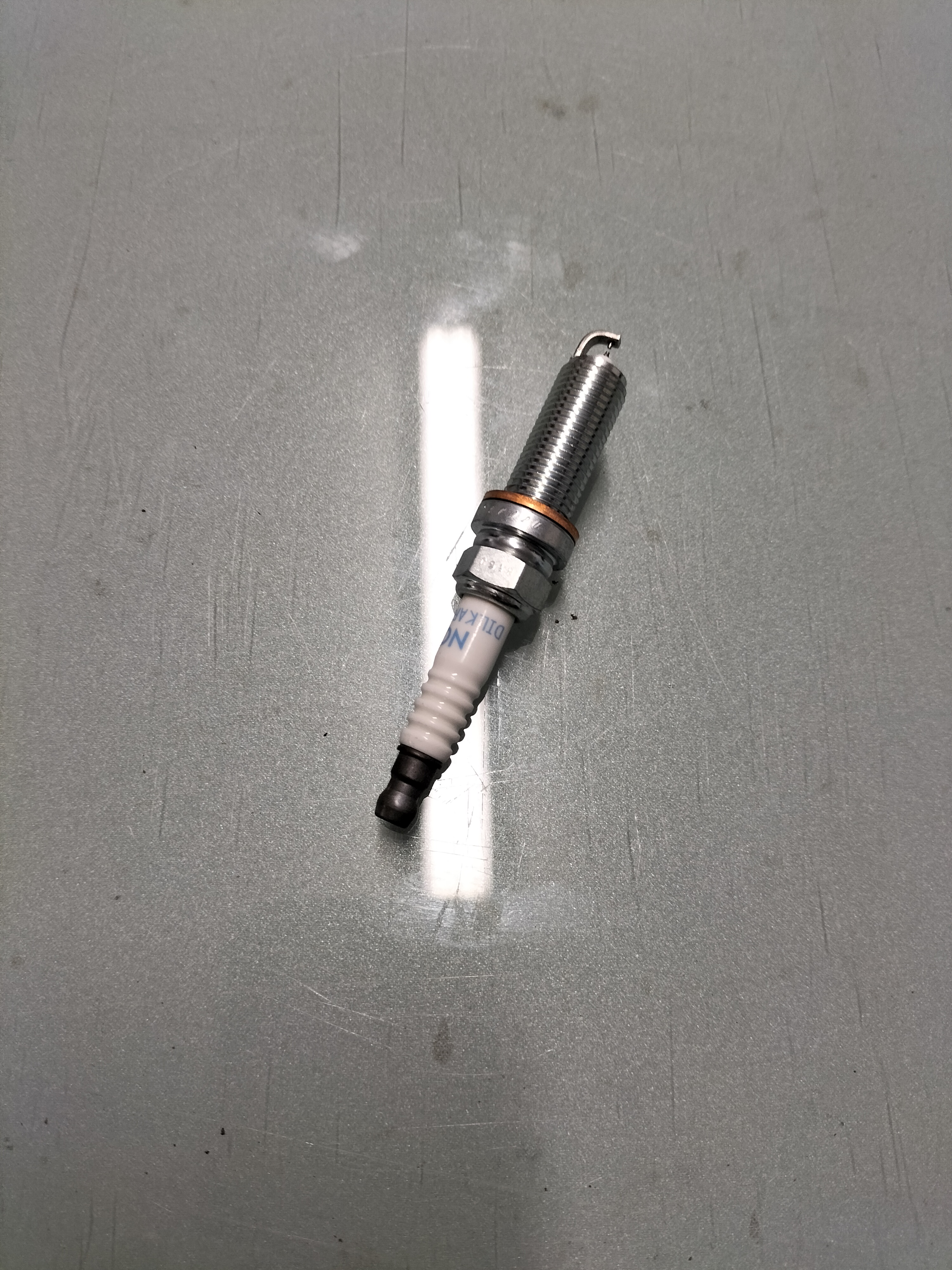 Spark plug Nissan 22401-1TT1C Original ( DILKAR7E9HS )